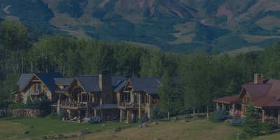A sprawling custom mountain estate showcasing the real estate value and expansive acreage available in Pagosa Springs, Colorado.